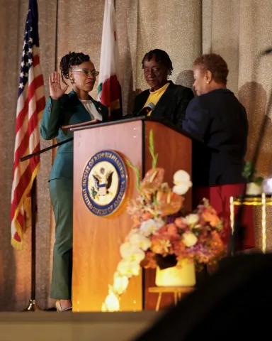 Congresswoman Simon being sworn in